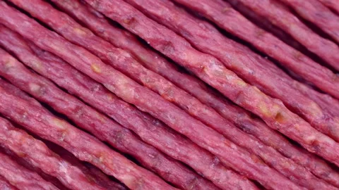 Red beef mini dried smoked sausages circle rotation close up Stock Footage 270475632