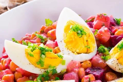 Red beet salad with egg Red beet salad with egg Copyright: xZoonar.com/Dzi... Stock Photos