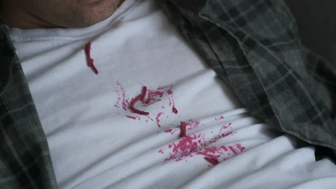 Red beetroot salad on white t-shirt, man in dirty t-shirt during eating. Video stock 152813167
