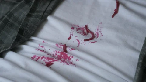 Red beetroot salad on white t-shirt, man in dirty t-shirt during eating. Stock Footage 153705130