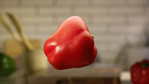 Red bell pepper jumping in slow motion Stock Footage 152903200