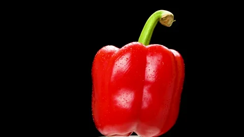 Red Bell Pepper Rotating On Black Background With Water Drops Stock Footage 325563201