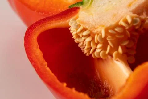 Red bell pepper in section close-up on a white background Stock Photos
