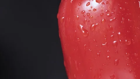 Red bell pepper spray close up, drops of water going down Stock Footage 102568004