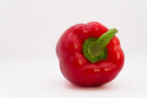 Red bell pepper on a white background, healthy eating from fruits and vegetables Stock Photos