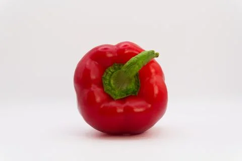 Red bell pepper on a white background, healthy eating from fruits and vegetables Stock Photos