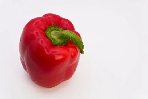 Red bell pepper on a white background, healthy eating from fruits and vegetables Stock Photos