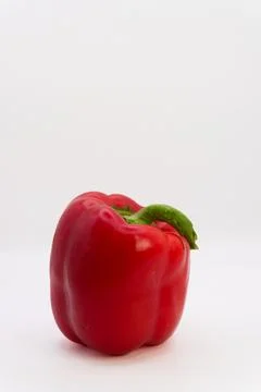 Red bell pepper on a white background, healthy eating from fruits and vegetables Stock Photos