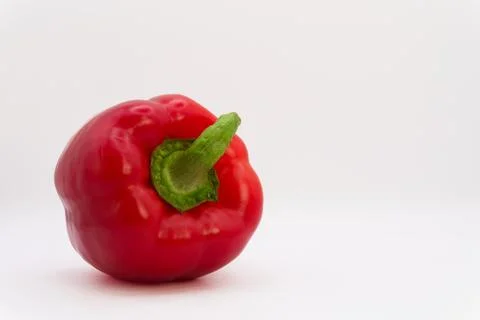 Red bell pepper on a white background, healthy eating from fruits and vegetables Stock Photos