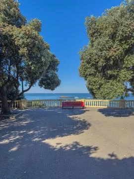 Red bench with ocean view in Foz do Douro Porto Stock Photos