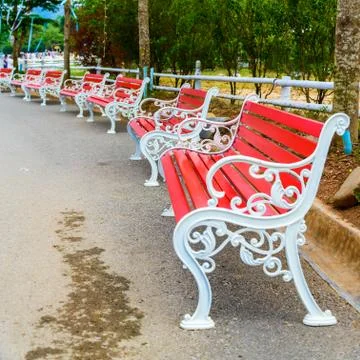 Red bench in the park Stock Photos