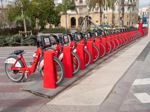 Red Bicing electric bikes at a docking station in Barcelona Stock Photos