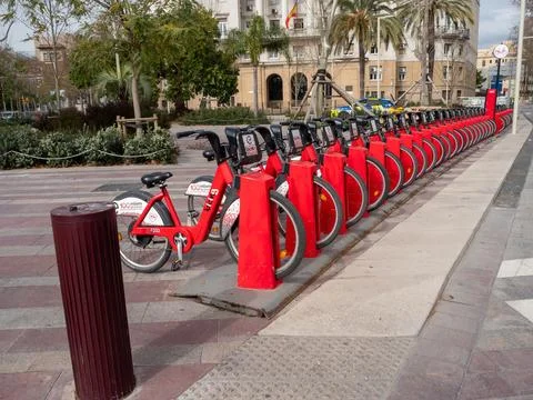 Red Bicing electric bikes at a docking station in Barcelona Stock Photos