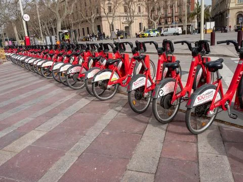 Red Bicing electric bikes at a docking station in Barcelona Stock Photos