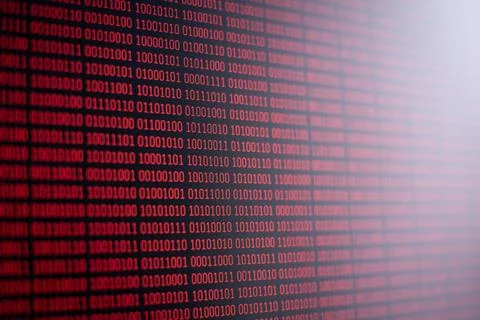 Red binary code on computer screen Stock Photos