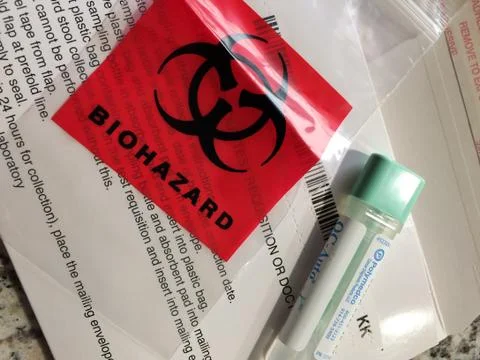 Red biohazard label mailer Stock Photos