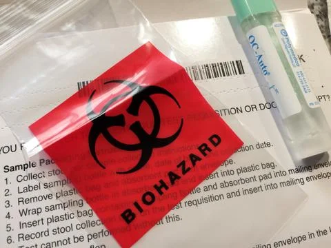 Red biohazard label mailer Stock Photos