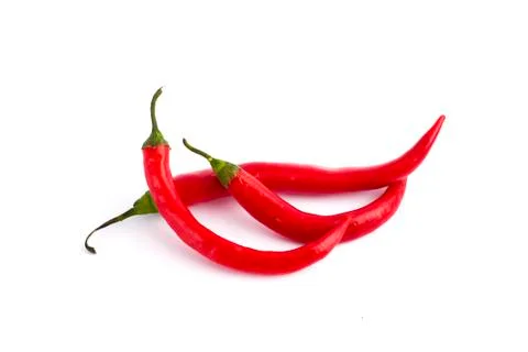 Red bitter pepper on a white background. Three Red bitter pepper on a white b Stock Photos
