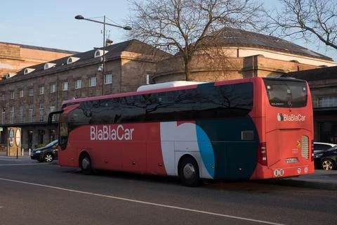 Red blablabus in front of the train station in the street, Stock Photos