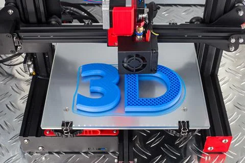 Red black 3D printer printing blue logo symbol on metal diamond plate future  Stock Photos