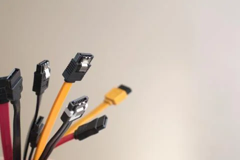 Red, black and yellow computer data cables. Network server infrastructure. Stock Photos