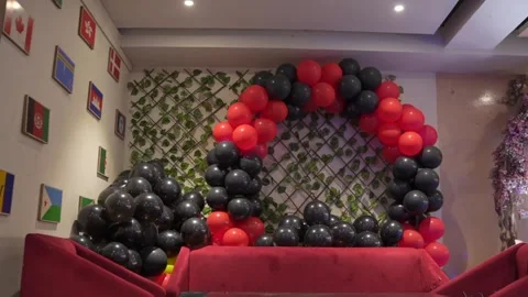 Red Black Balloon Arch Birthday Party BackgroundHd Clip Stock Footage 337429352