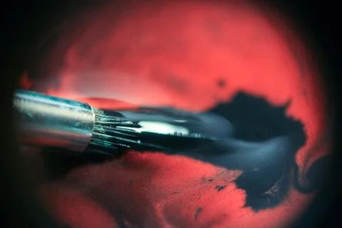 Red in black Stock Photos