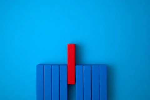 Red block blocking blue blocks. Stock Photos