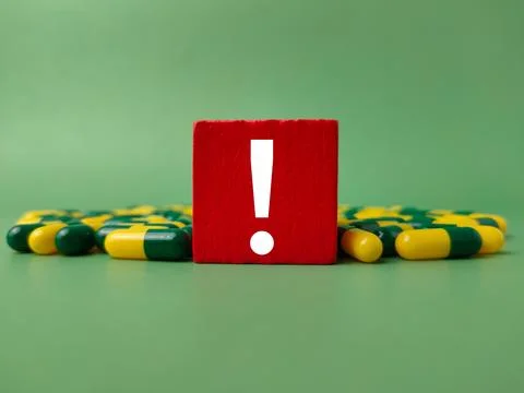 The red block with an exclamation mark represents a critical alert or cauti.. Stock Photos