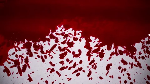 Red Blots Fill the White Background with Drops Close-up Video stock 254660337