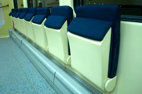 Red blue comfortable seats on the train Stock Photos