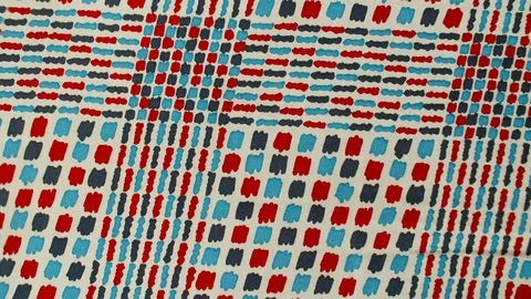 Red Blue Pattern texture silk fabric blows in wind in 4K Stock Footage 129395176