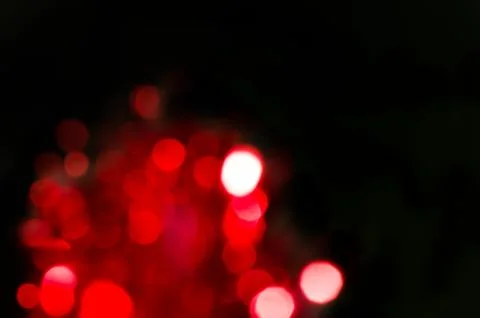 Red blur circle lights flame as abstract background. Stock Photos