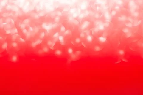 Red blurred abstract background with defocus light. With bokeh effect Stock Photos