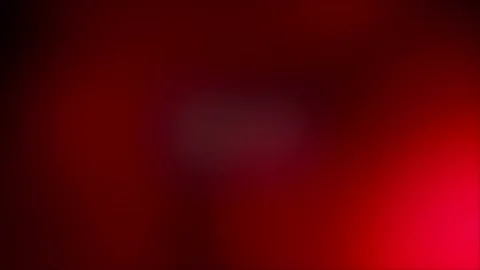 Red Blurred Background with Dark Gradient and Central Glow Stock Footage 326990775