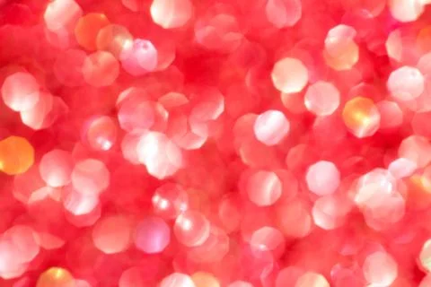 Red blurred background with light spots Stock-Fotos