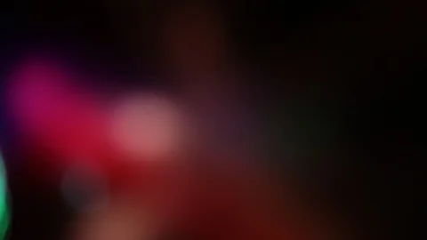 Red blurred spots float on the background of other colors Stock-Footage 105944038