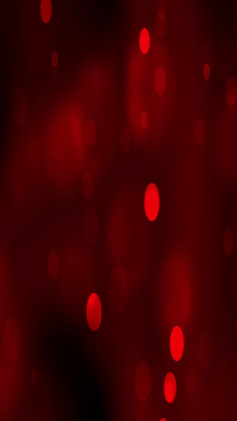 Red blurry circles on dark red background. Stockbeeldmateriaal 296712628