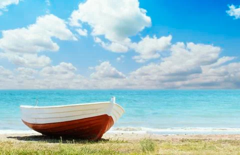 Red Boat on the beach Stock Photos