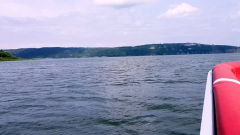 The red boat sails on the river Stock Footage 91319127