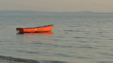Red boat in the sea Stock Footage 80433644