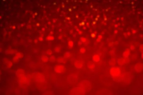 Red bokeh background effect. Hot defocused red lights Stock Photos