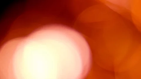 Red bokeh light effect abstract background, animation of sparkle circles Stock Footage 125614896