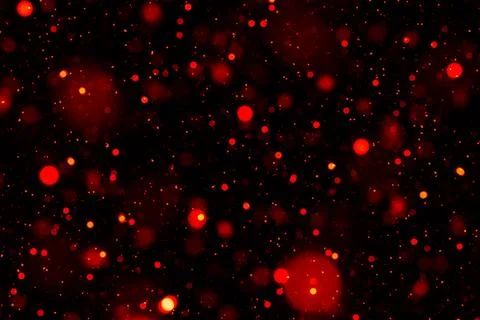 Red bokeh lights abstract background with glow and sparkling dots for design and Stock Photos