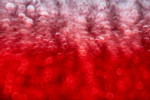 Red bokeh texture background. Abstract blurry circles Stock Photos