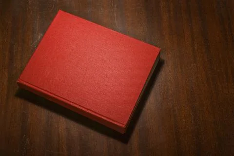 Red book on the table Stock Photos