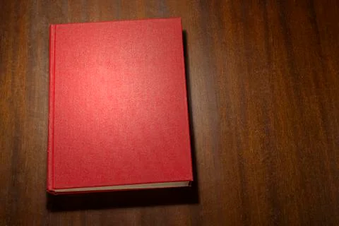 Red book on the table Stock Photos