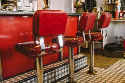 Red Booth Stools in a Diner Stock Photos