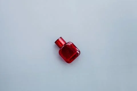 Red bottle of perfume Stock Photos