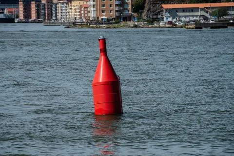 Red bouy in the river Stock Photos